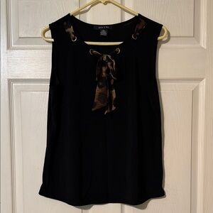 Elegant Black Sleeveless Top with Brown Details